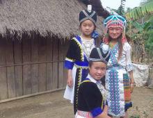 Children wear traditional dress. 